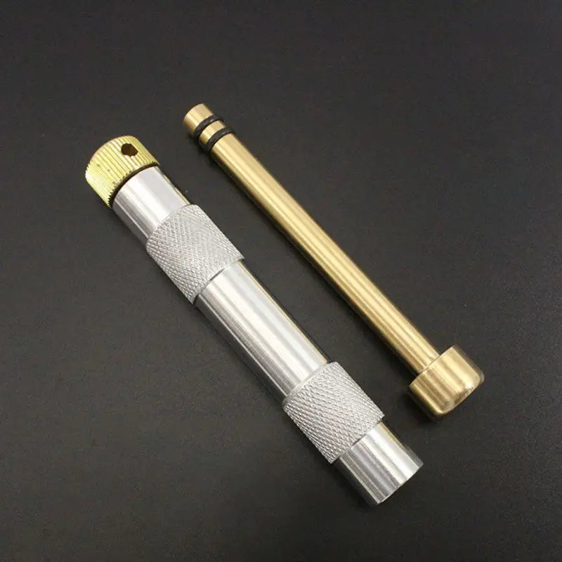 Briquet de survie a piston