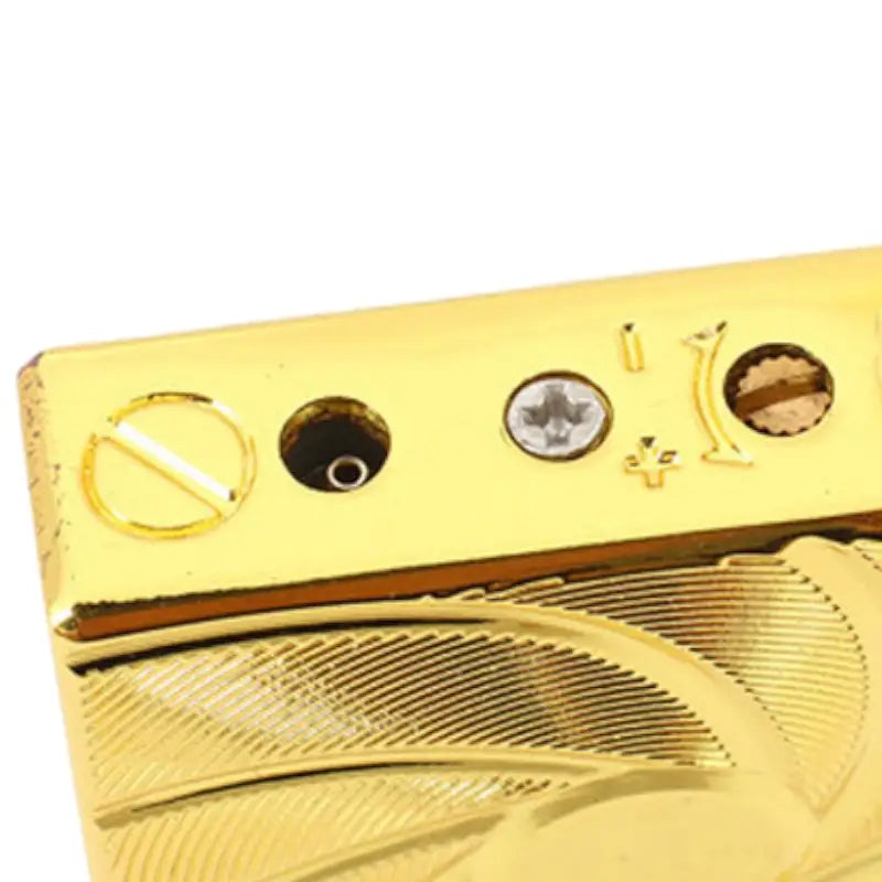 Briquet tempête doré à gravure Art nouveau