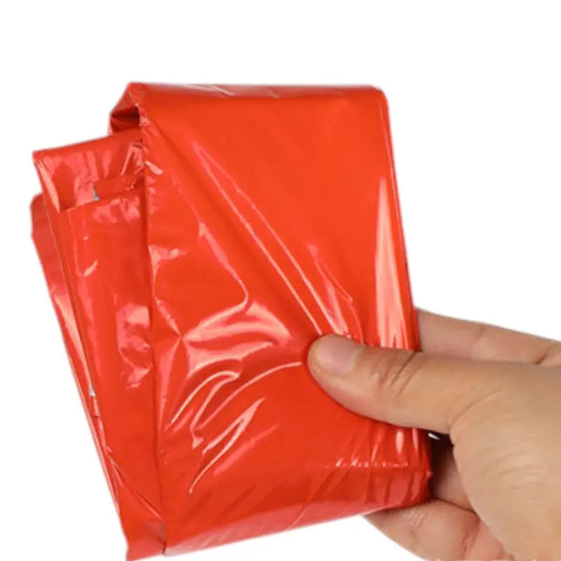 Poncho de survie thermique
