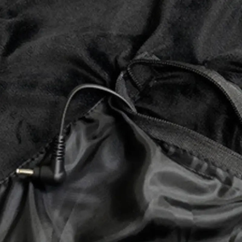 Veste chauffante électrique pilotable par appli
